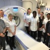Scarborough Hospital Radiography team standing by the new CT scanner.