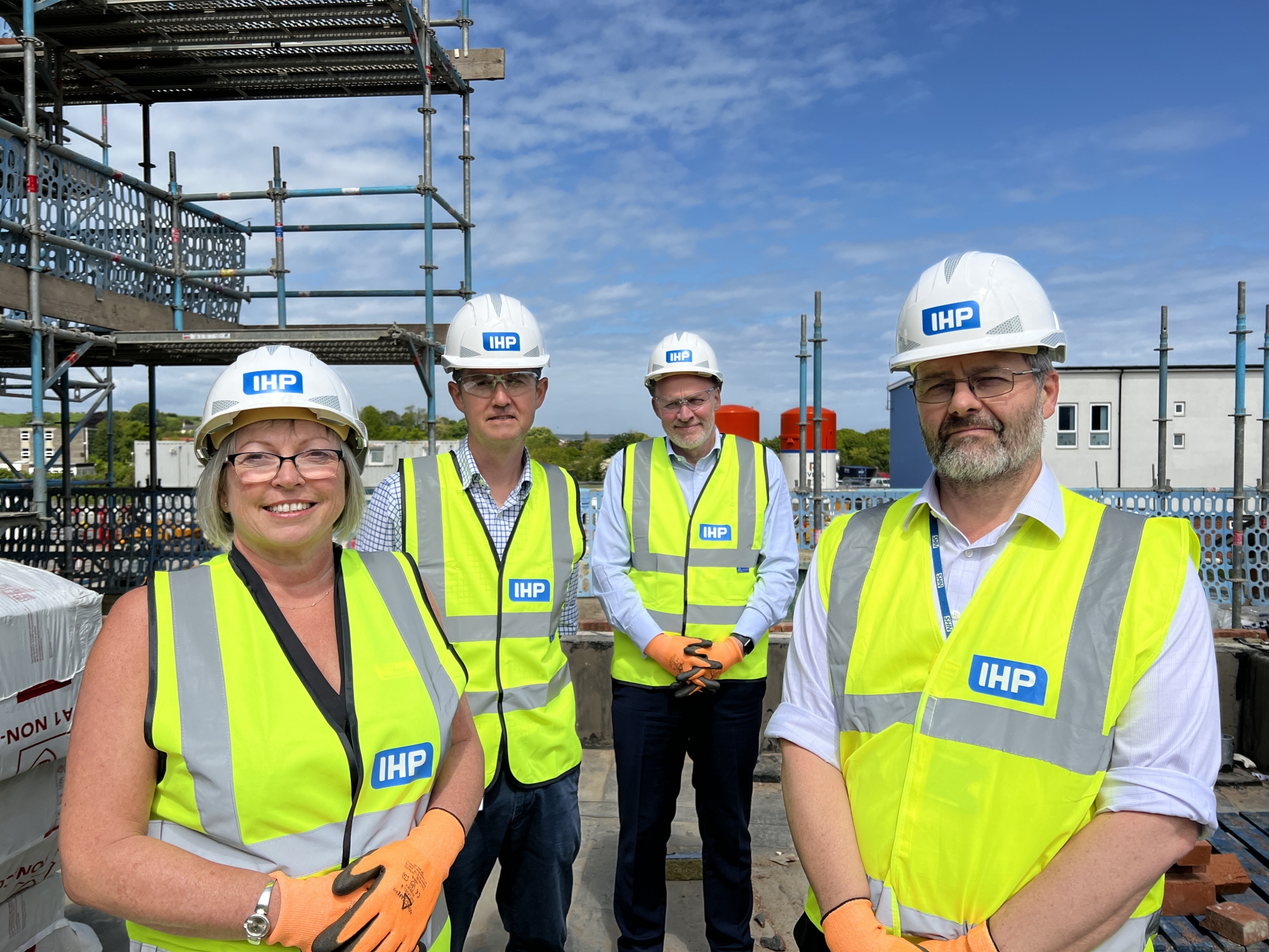 Trust staff wearing IHP protective clothing while stood on the roof terrace of the new emergency department in Scarborough.