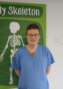 Alex in his work scrubs.