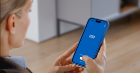 Person using a smart phone to access the NHS app.