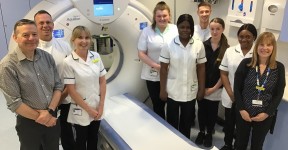Scarborough Hospital Radiography team standing by the new CT scanner.