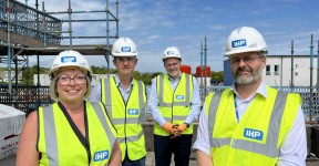 Trust staff wearing IHP protective clothing while stood on the roof terrace of the new emergency department in Scarborough.