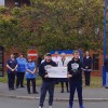 Peter Hutchinson and Lewis Wilkinson outside Scarborough Hospital with nursing staff having completed a 100km walk over 10 days to raise money