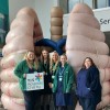 Lung Cancer Nurse Specialists from our hospitals standing in front of a 12ft pair of inflatable lungs.
