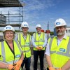 Trust staff wearing IHP protective clothing while stood on the roof terrace of the new emergency department in Scarborough.