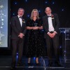 Philippa onstage at the awards ceremony with Simon Morritt, Chief Executive, and Andrew Bertram, Finance Director.