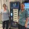 Sara Shearing, Senior Health Care Assistant, and Karroll Powell, Associate Nurse Practitioner, with one of the new mobile phone charging units.