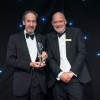 Dr Turvill collecting his award from Chief Executive Simon Morritt.