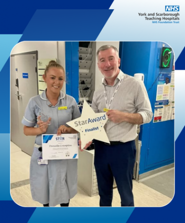 Star Award winner Danielle Crampton receiving her award from Andrew Bertram, Finance Director