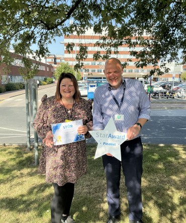 Star Award winner Leanne Crangle receiving her award from the Trust's Chief Executive, Simon Morritt.