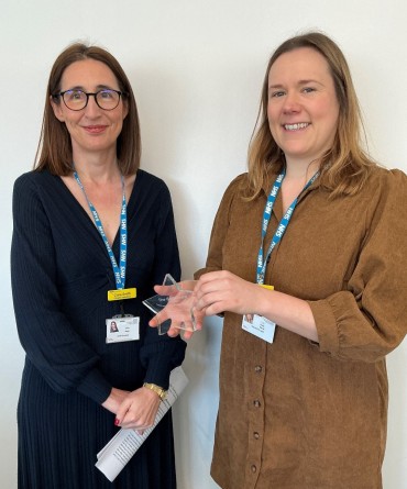 Star Award winner Emily Douse receiving her award from Clare Smith, Chief Executive.