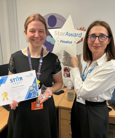 Star Award winner Jessica Savage receiving her award from Clare Smith, Chief Executive.