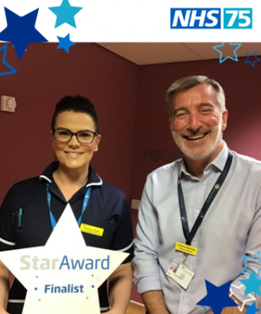 Star Award winner Victoria Clark receiving her award from the Trust's Finance Director Andrew Bertram.