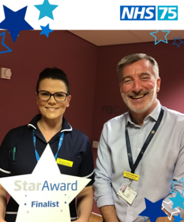 Star Award winner Victoria Clark receiving her award from the Trust's Finance Director Andy Bertram