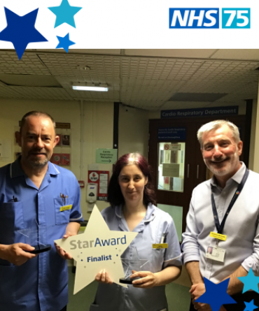 Star Award winners Clinton Cooper and Lyndsay Crossman receiving their award from Andy Bertram the Trust's Finance Director