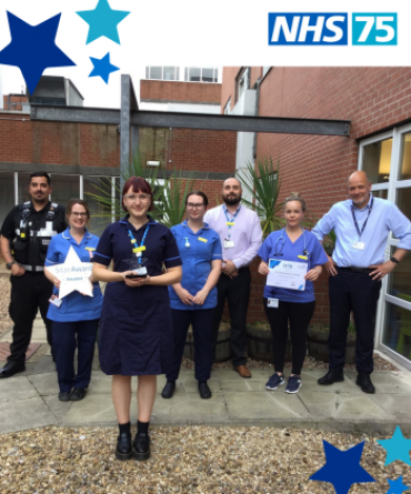 The Admission Team receiving their Star Award from Simon Morritt, the Trust's Chief Executive.