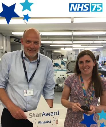 Star Award winner Polly Boyes receiving her award from Simon Morritt, the Trust's Chief Executive.