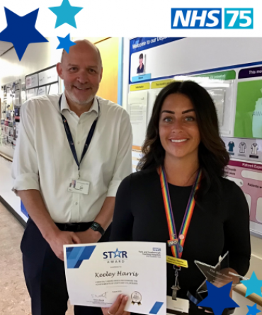Star Award winner Keeley Harris receiving her award and certificate from Simon Morritt, the Trust's Chief Executive.