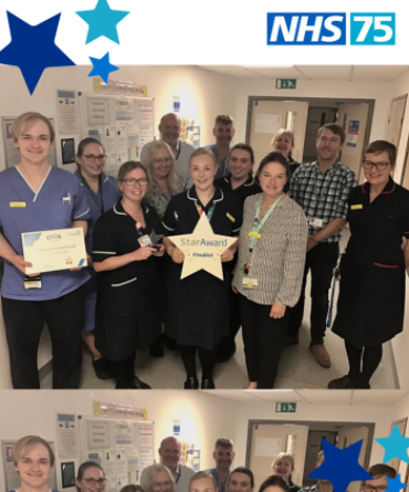 The Intensive Care Unit receiving their Star Award and certificate from Simon Morritt, the Trust's Chief Executive.