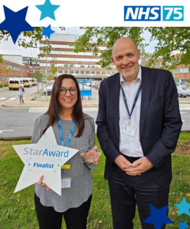 Star Award winner Laura Blissett receiving her award from Simon Morritt, the Trust's Chief Executive