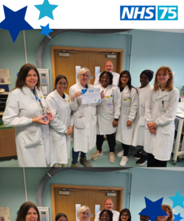 Blood Sciences Specimen Reception receiving their Star Award from Simon Morritt, the Trust's Chief Executive.