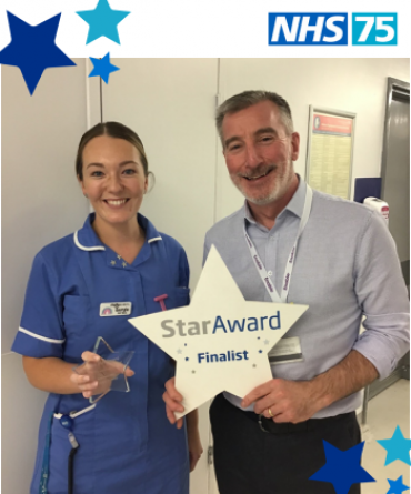 Star Award winner Georgia Bowlby receiving her award from Andrew Bertram, the Trust's Finance Director.