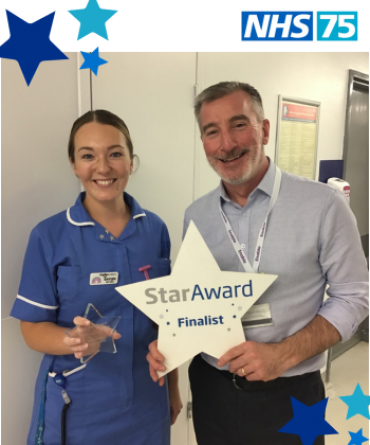 Star Award winner Georgia Bowlby receiving her award from Andy Bertram, the Trust's Finance Director