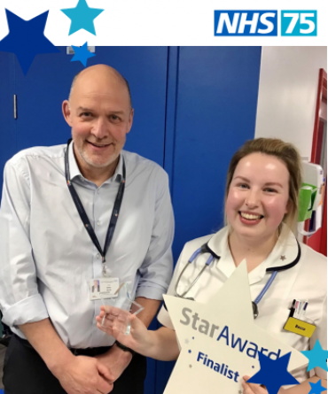 Star Award winner Rebecca Wilson receiving her award from Simon Morritt, the Trust's Chief Executive.