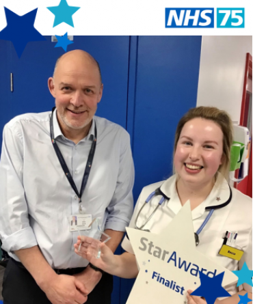 Star Award winner Rebecca Wilson receiving her award from Simon Morritt, the Trust's Chief Executive