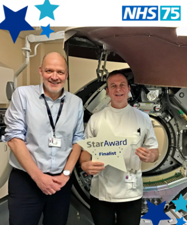 Star Award winner Darren Ford receiving his award from Simon Morritt, the Trust's Chief Executive