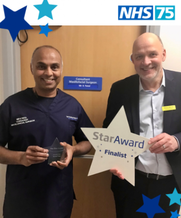 Star Award winner Kanak Patel receiving his award from Simon Morritt, the Trust's Chief Executive