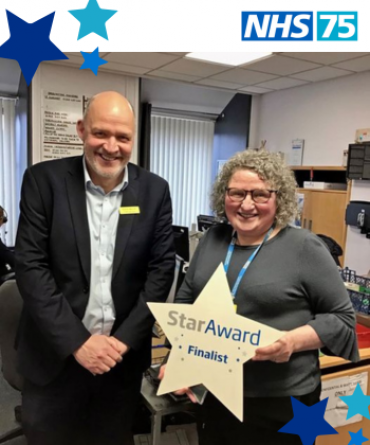 Star Award winner Sue Thompson receiving her award from Simon Morritt, the Trust's Chief Executive