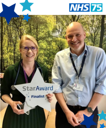 Star Award winner Anna Watt receiving her award from Simon Morritt, the Trust's Chief Executive