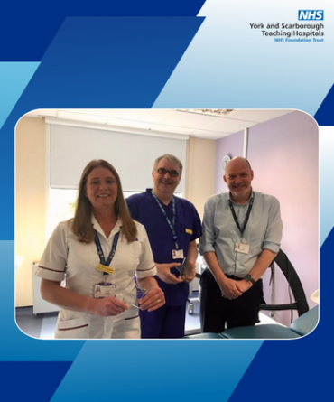 Star Award winners Robert Shaw and Lorraine Hodgetts receiving their award from the Trust's Chief Executive, Simon Morritt