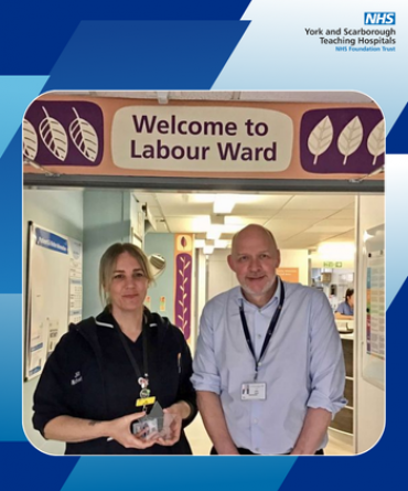 Jill Robertson receiving her Star Award from Simon Morritt, Chief Executive