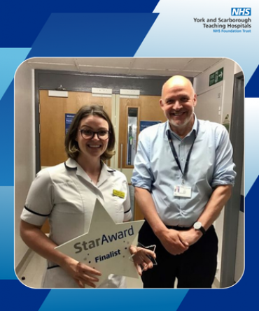 Emma Lee receiving her Star Award from Simon Morritt, Chief Executive