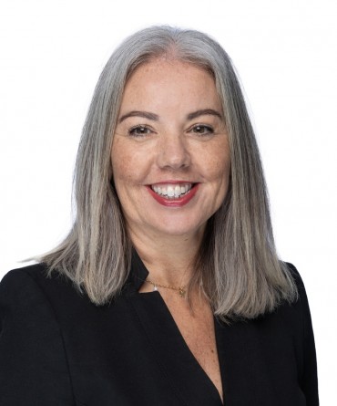 Headshot of Claire Hansen, Chief Operating Officer.