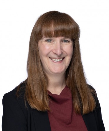 Headshot of Lucy Brown, Director of Communications.
