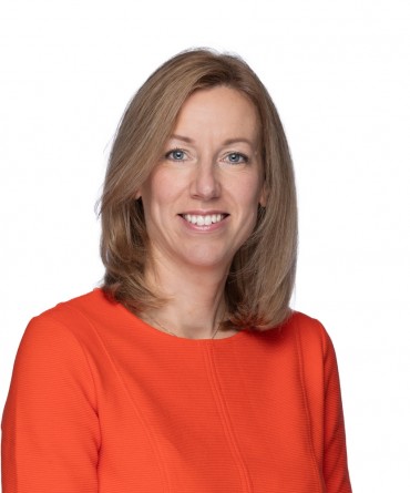 Headshot of Polly McMeekin.