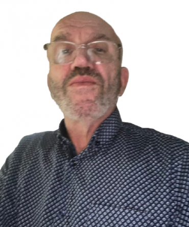 Headshot of Paul Gibson.