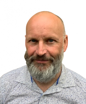 Headshot of Dr Gary Kitching.