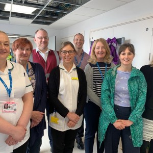 A group of eight members of staff.
