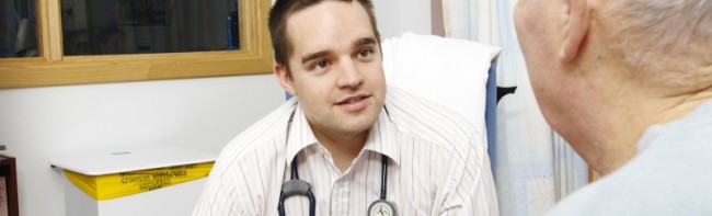A doctor talking to a patient.